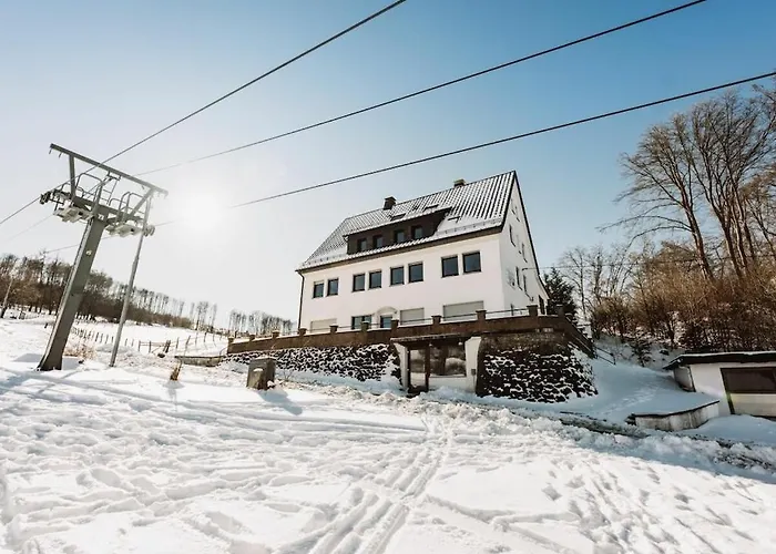 Q-stall, 02 Feriehus